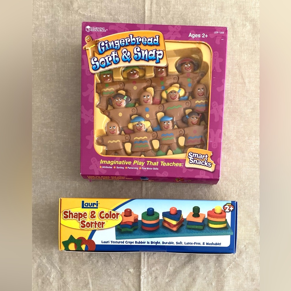 Gingerbread Sort & Snap.  And   Shape & color sorter.  Brand new